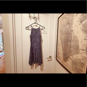 Blue and white print dress with high neckline and back keyhole